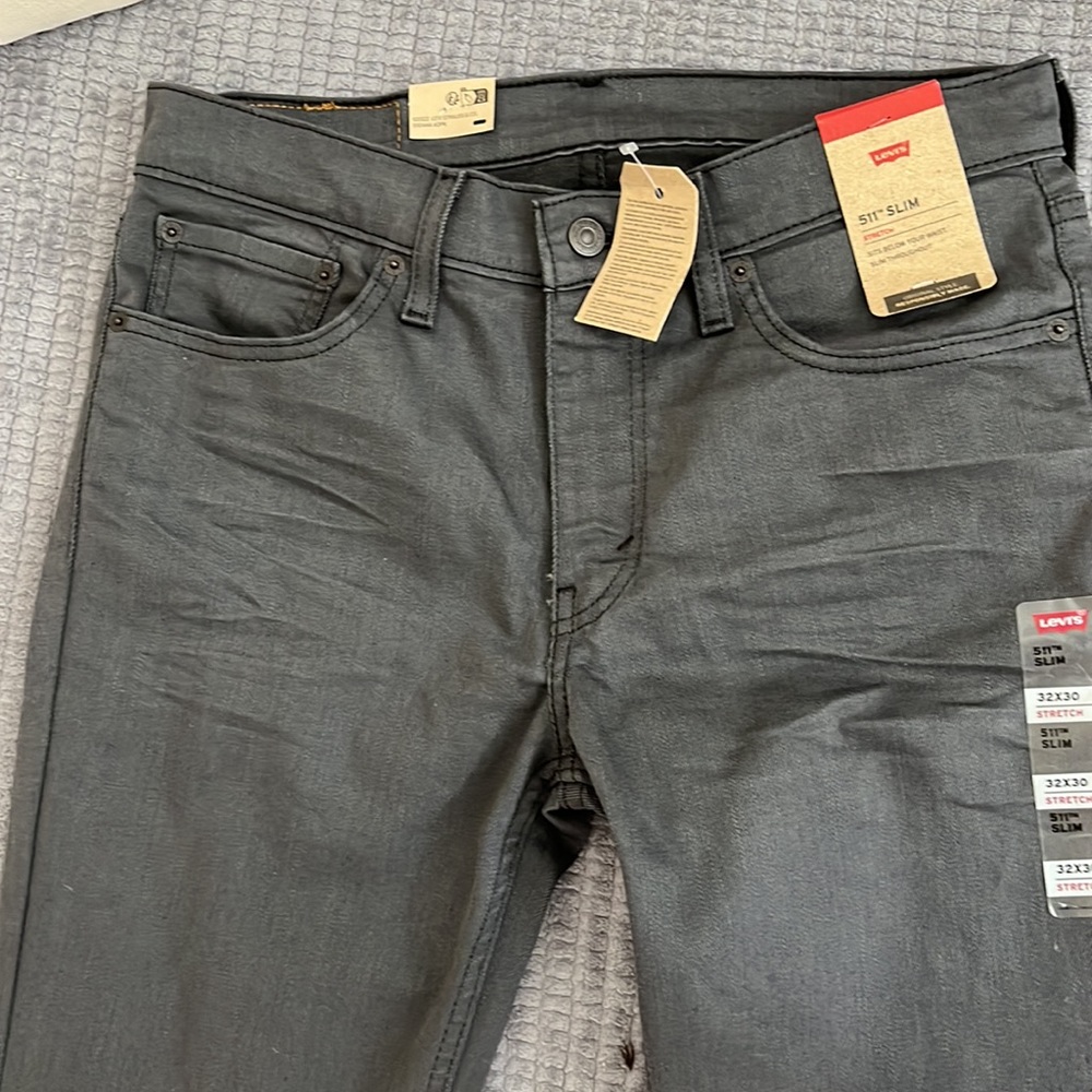 Levi’s SLIM stretch, men pants, and gray. Size 32x30 never worn with tag